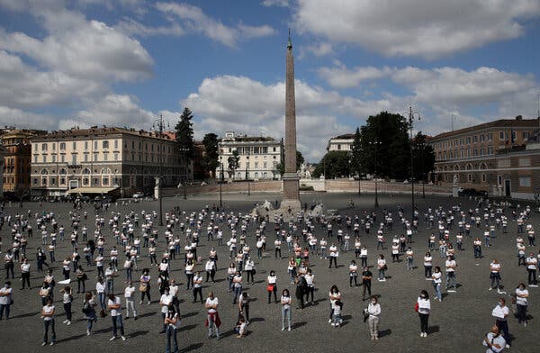 Nurses practiced social distancing while protesting for better working conditions following the coronavirus pandemic in Rome&rsquo;s Piazza del Popolo square, in June.